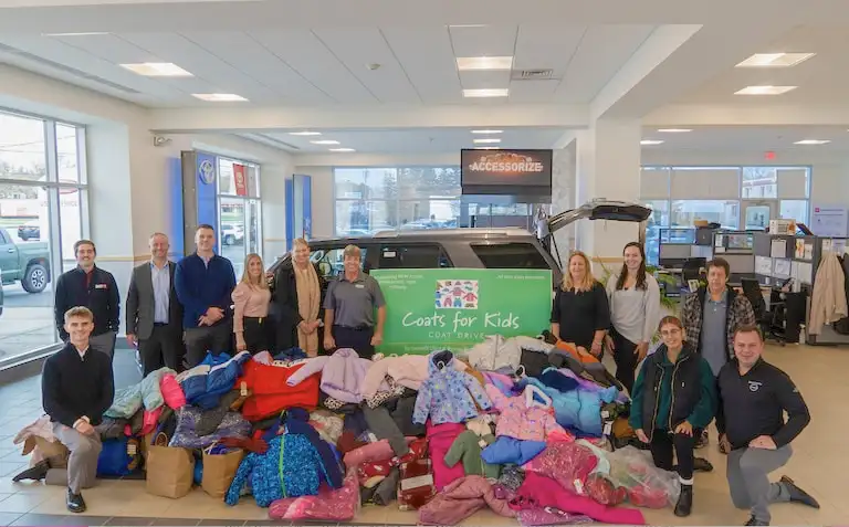 Steet Ponte Nissan Employees with coat donations for Coats For Kids